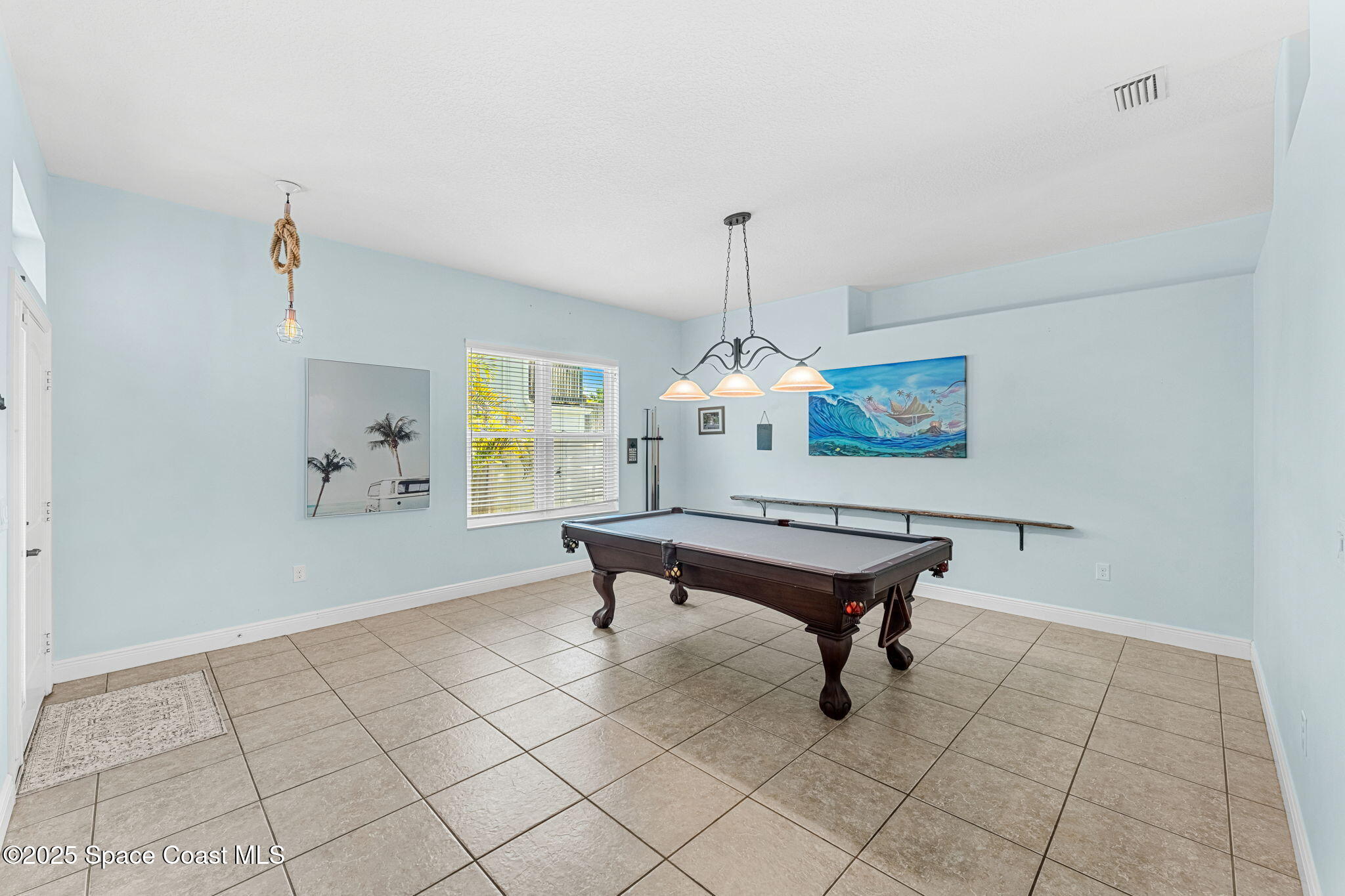 1121 South Orlando Avenue Cocoa Beach, FL 32931 - Photo 10 of 48 Front Foyer to Billards Area