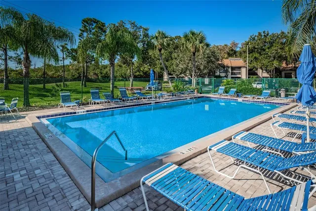 a view of a backyard with a patio and wooden floor