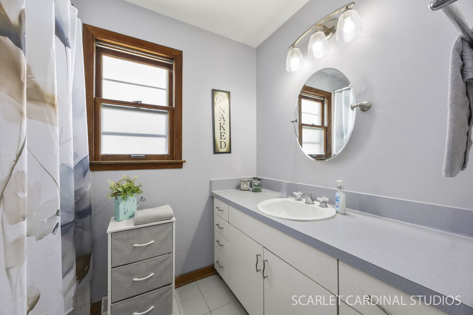 509 South Westmore-Meyers Road Lombard, IL 60148 - Photo 15 of 23 a bathroom with a granite countertop sink mirror and a window