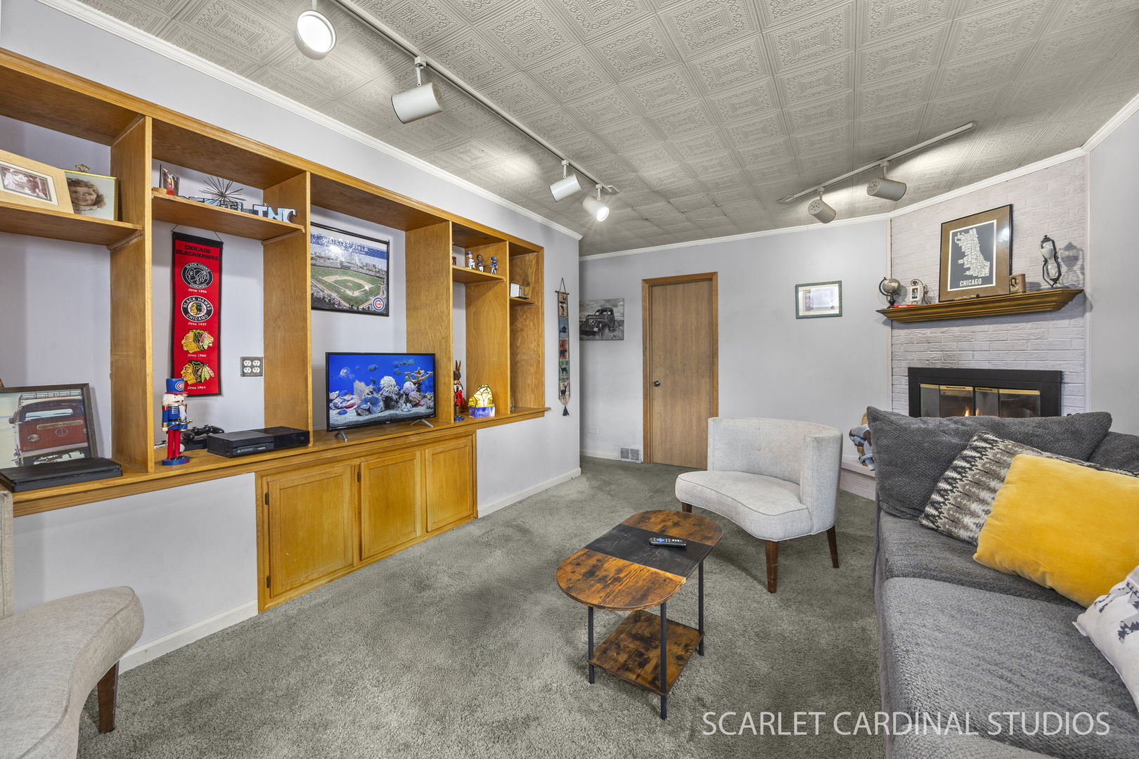 509 South Westmore-Meyers Road Lombard, IL 60148 - Photo 20 of 23 a living room with furniture and a flat screen tv