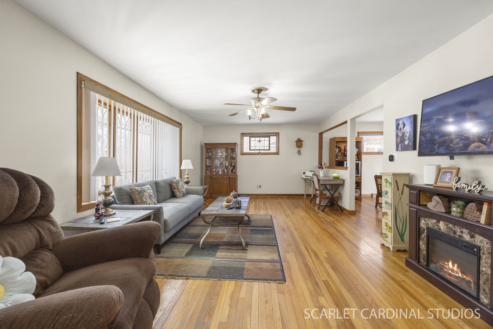 509 South Westmore-Meyers Road Lombard, IL 60148 - Photo 4 of 23 a living room with furniture and a flat screen tv