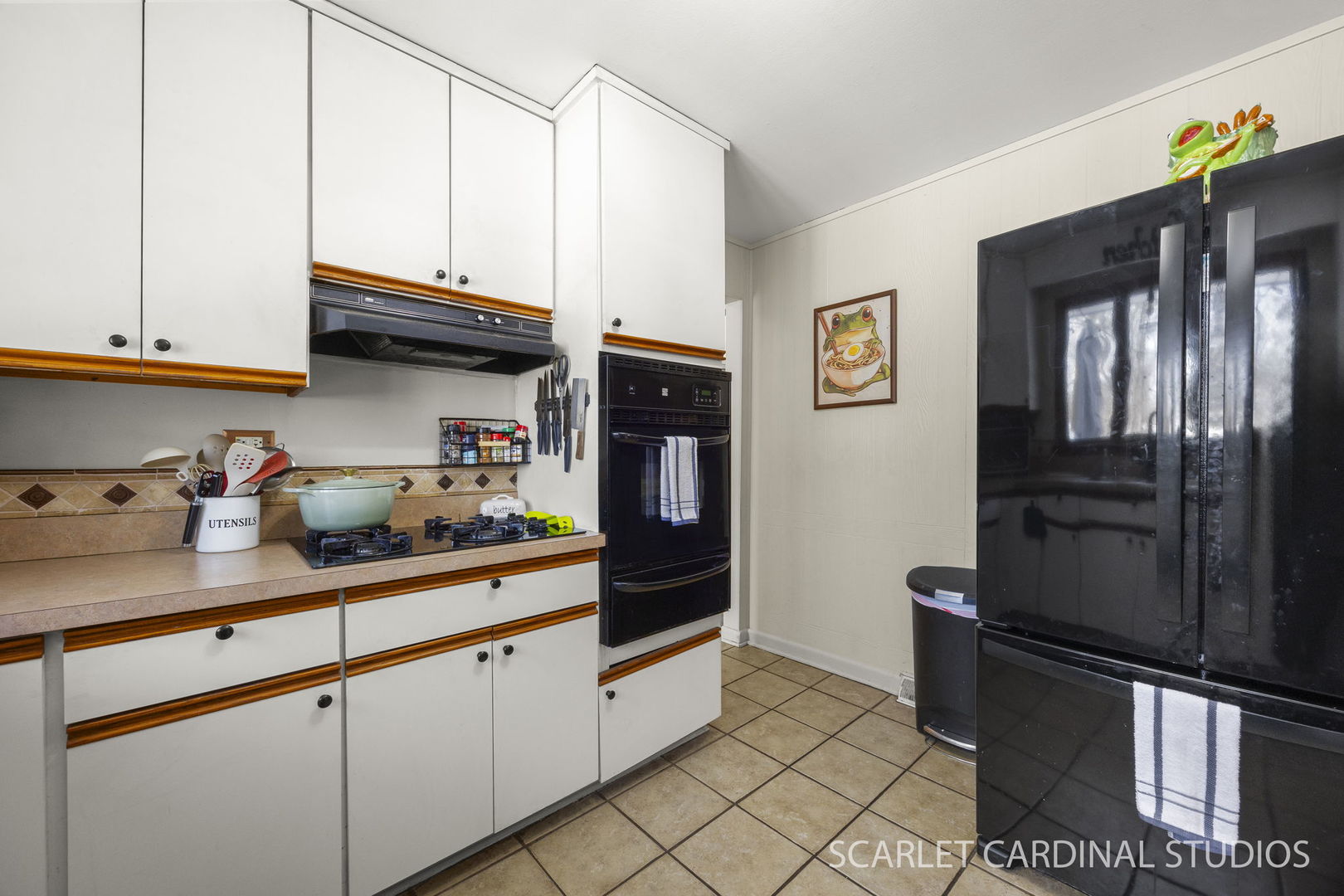 509 South Westmore-Meyers Road Lombard, IL 60148 - Photo 9 of 23 a kitchen with stainless steel appliances granite countertop a refrigerator and a stove