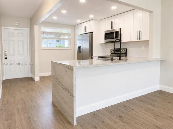 $179,900 | 1701 Northwest 75th Avenue, Unit 104, Plantation, FL 33313