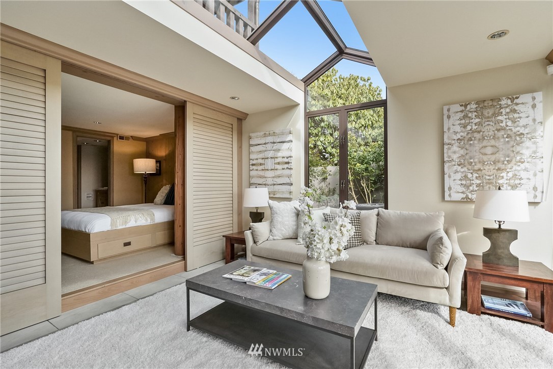 6410 Northeast Windermere Road Seattle, WA 98105 - Photo 28 of 40 a living room with furniture and a large window