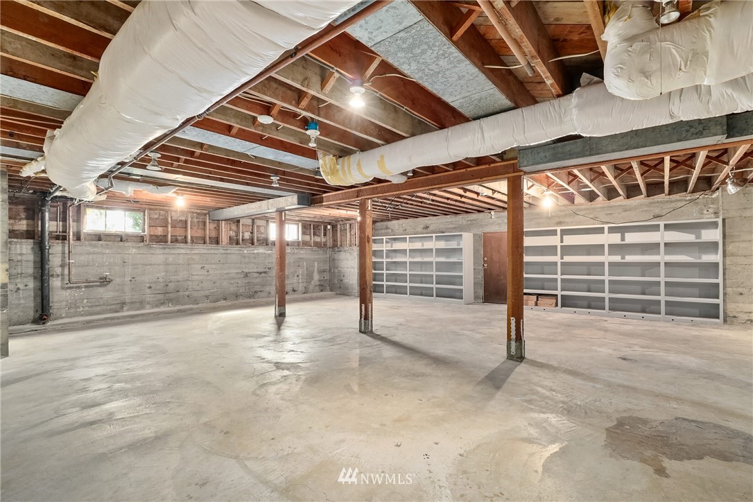 6410 Northeast Windermere Road Seattle, WA 98105 - Photo 39 of 40 a view of an empty room with windows
