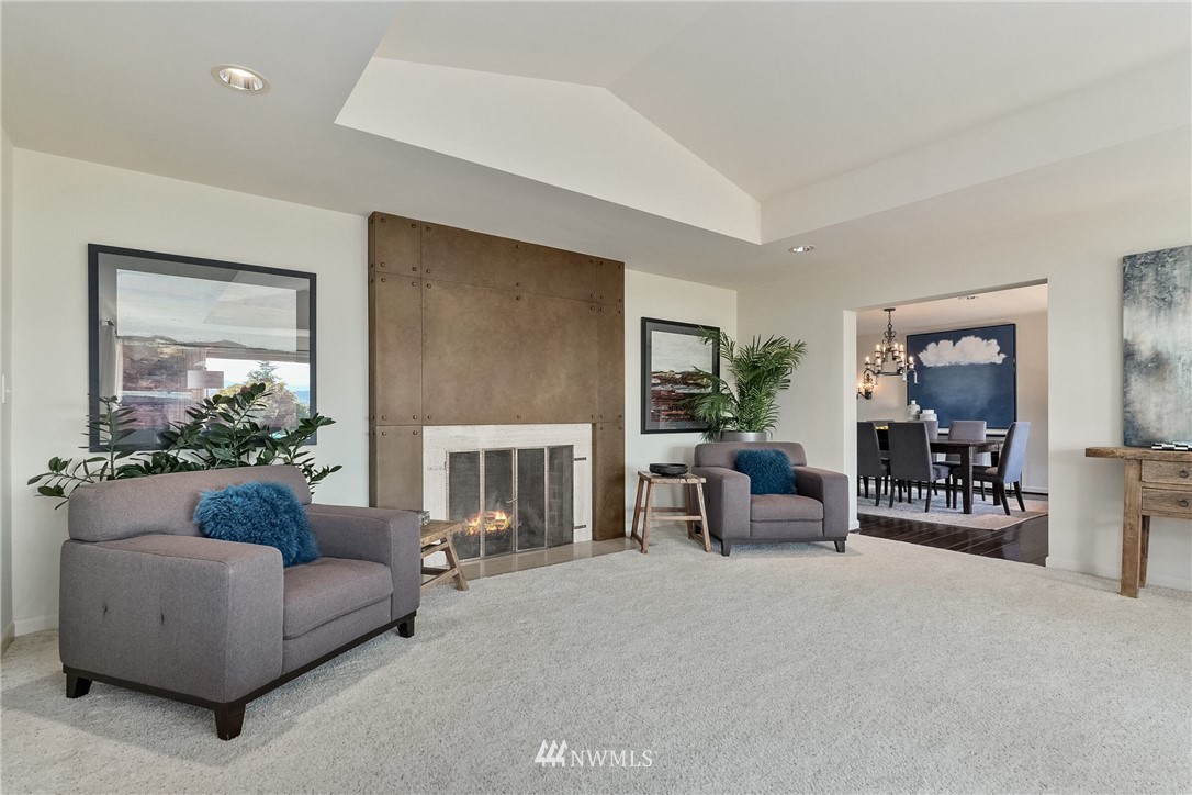 6410 Northeast Windermere Road Seattle, WA 98105 - Photo 9 of 40 a living room with furniture and a fireplace
