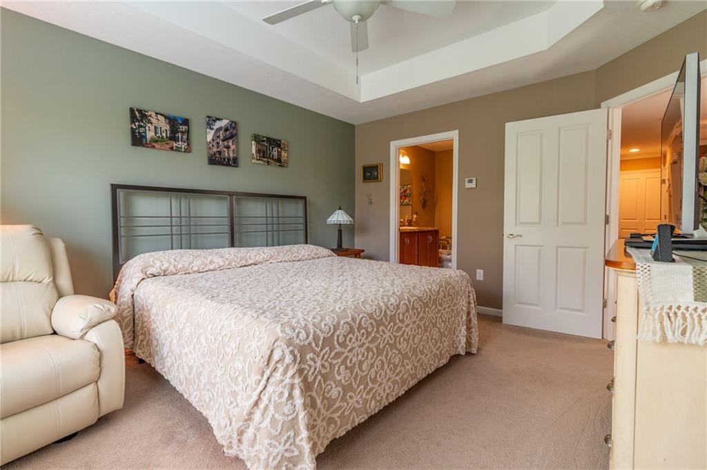 425 Chestnut Lane Apollo, PA 15613 - Photo 22 of 48 a bedroom with a large bed and a couch