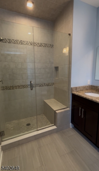 9 Prospect Street, Unit 303 Morristown, NJ 07960 - Photo 4 of 8 a bathroom with a shower