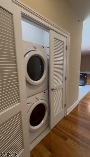 9 Prospect Street, Unit 303 Morristown, NJ 07960 - Photo 8 of 8 a view of a hallway with washer and dryer