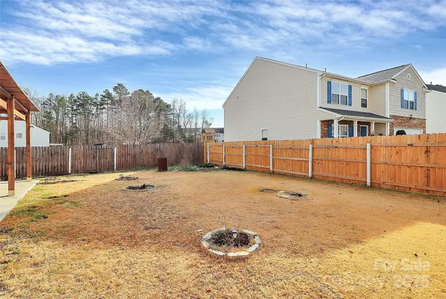 a front view of a house with a outdoor space