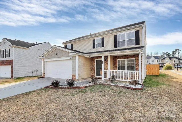 front view of a house with a patio