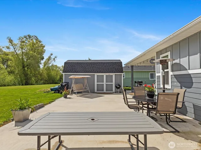 a house view with a sitting space garden view with a sitting space