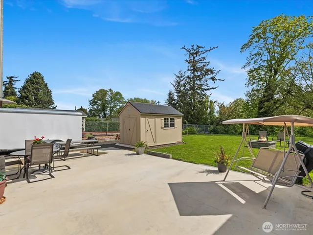 a view of a lake with a yard