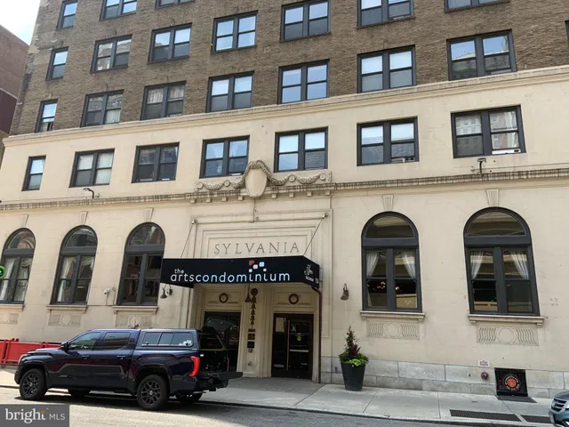 a front view of a building with multiple windows