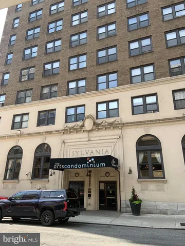 a car parked in front of a building