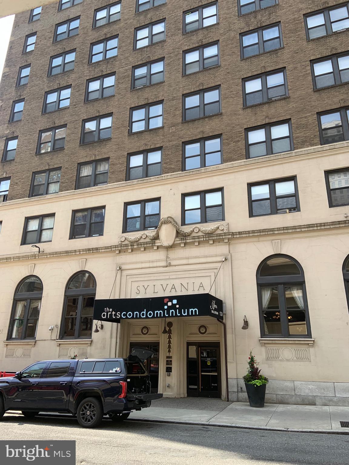 1324 Locust Street, Unit 901 Philadelphia, PA 19107 - Photo 2 of 5 a car parked in front of a building