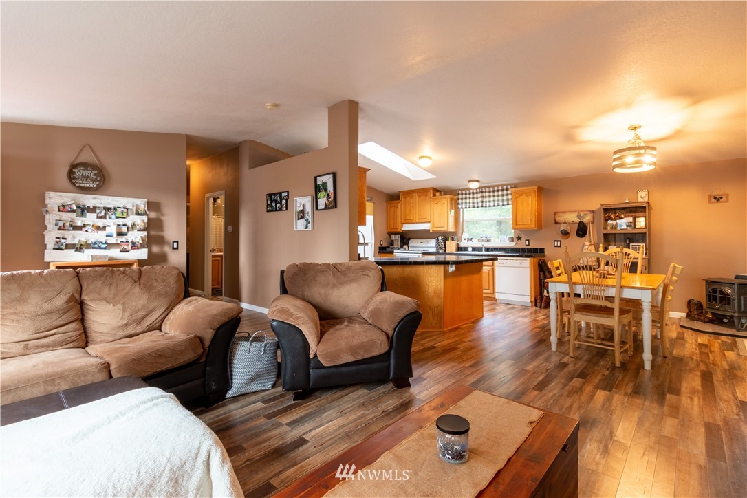176 Nelson Road Winlock, WA 98596 - Photo 3 of 16 a living room with furniture and a wooden floor