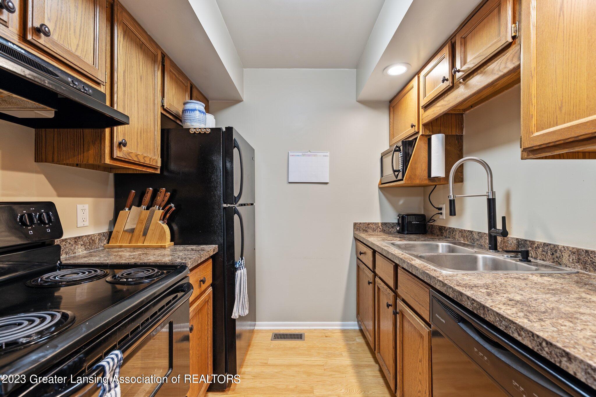 205 East Jolly Road, Unit 2 Lansing, MI 48910 - Photo 9 of 21 Kitchen