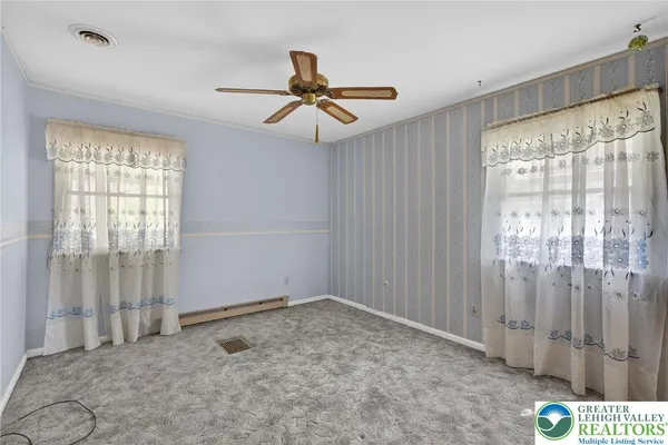 a view of a livingroom with a fireplace