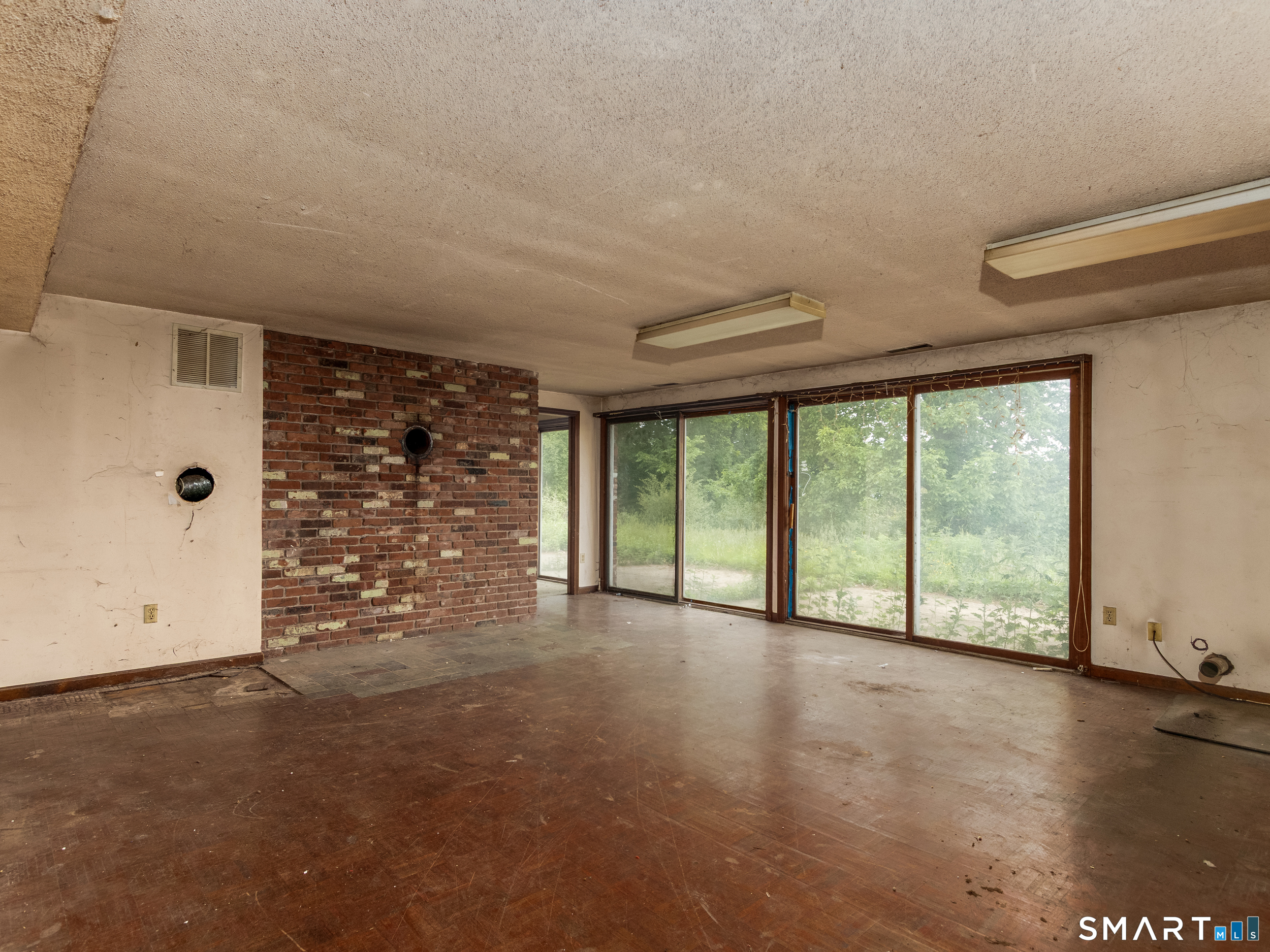 63 High Hill Road Wallingford, CT 06492 - Photo 21 of 34 a view of an empty room with a window