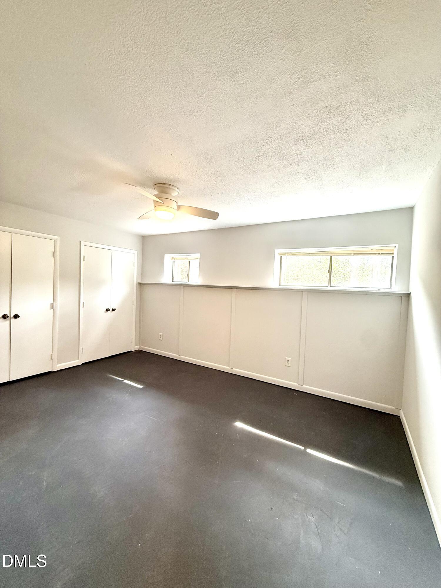 546 Pine Ridge Place Raleigh, NC 27609 - Photo 12 of 28 an empty room with a empty space