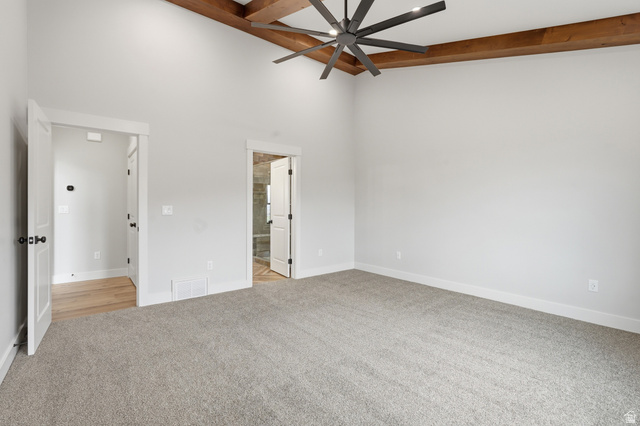 2970 North Mahogany Vly Road Logan, UT 84341 - Photo 12 of 39 Unfurnished bedroom featuring light carpet and a ceiling fan