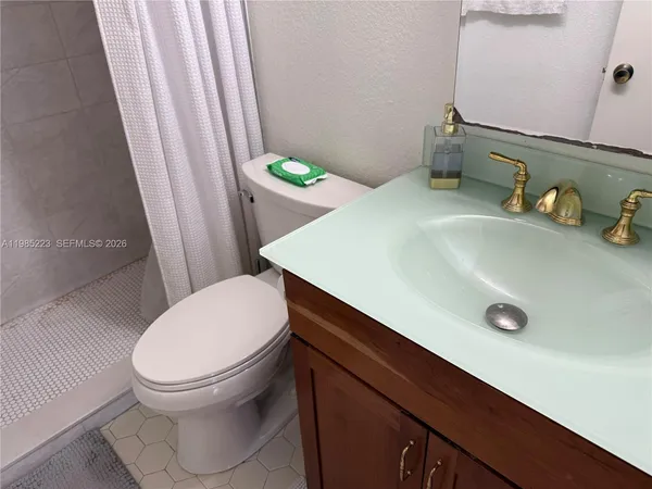 a view of a swimming pool and a yard