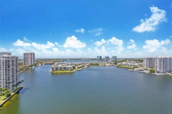 a view of a city and lake