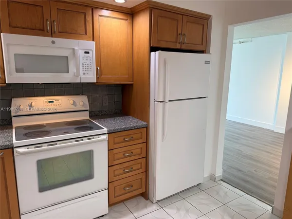 a utility room with washer and dryer