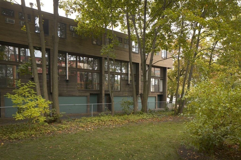 30 Inman Street, Unit C Cambridge, MA 02139 - Photo 7 of 8 a front view of a house with a glass windows