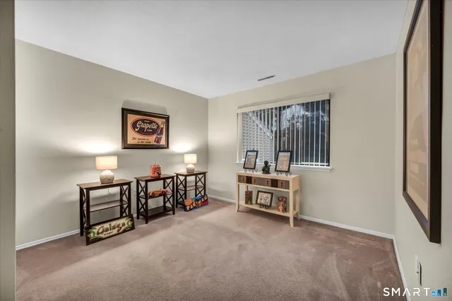 a view of a livingroom with furniture