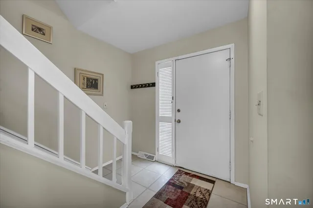 a view of entryway with stairs