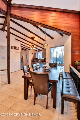 a view of a dining room with furniture