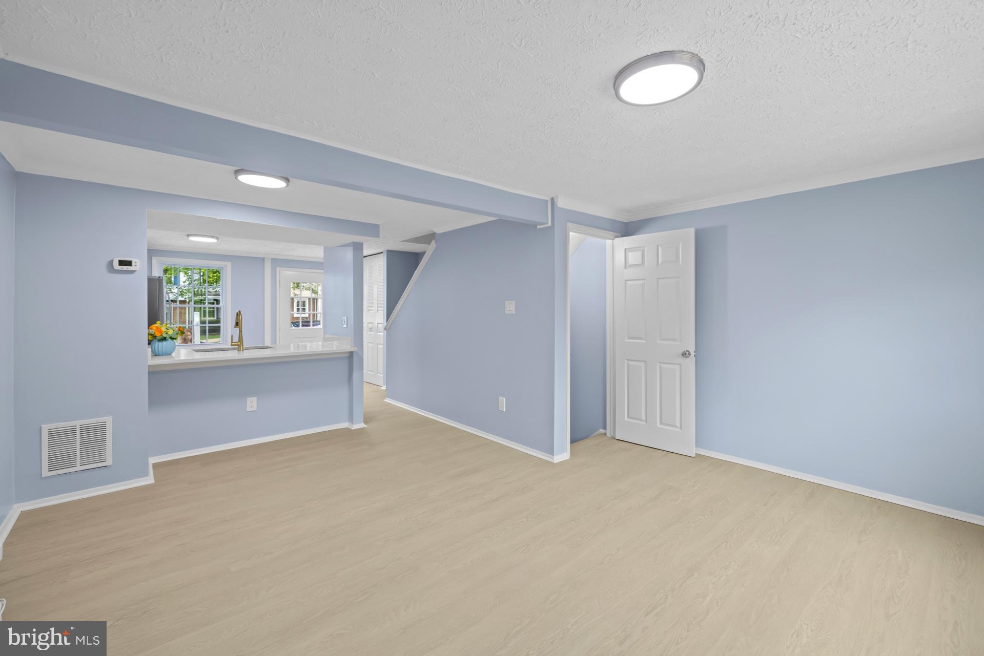 8318 Brookvale Court Springfield, VA 22153 - Photo 12 of 39 a view of an empty room with a window
