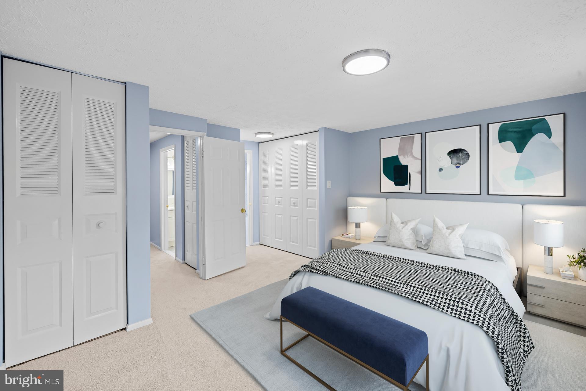 8318 Brookvale Court Springfield, VA 22153 - Photo 23 of 39 a bedroom with a bed and a painting on the wall