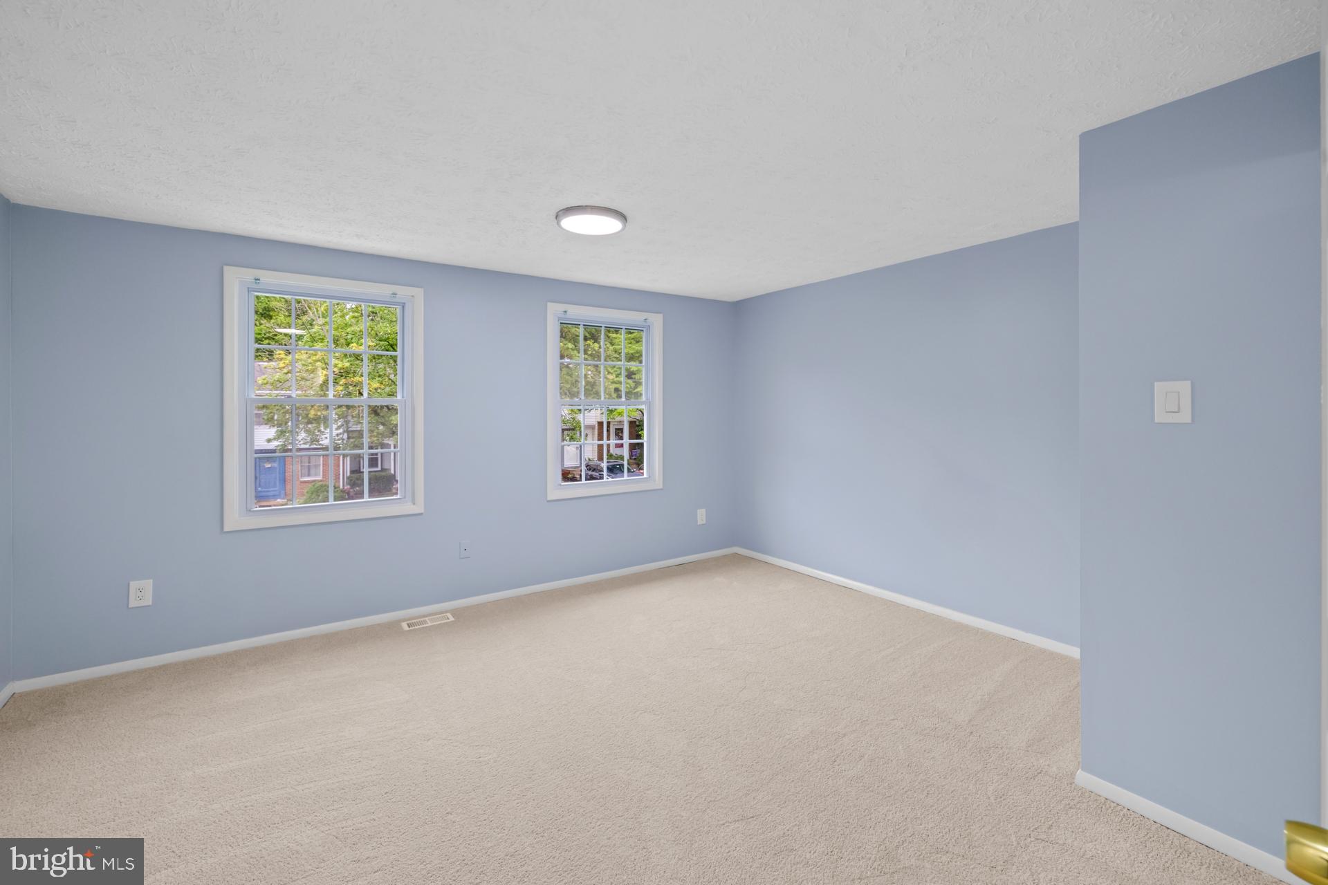 8318 Brookvale Court Springfield, VA 22153 - Photo 26 of 39 an empty room with windows