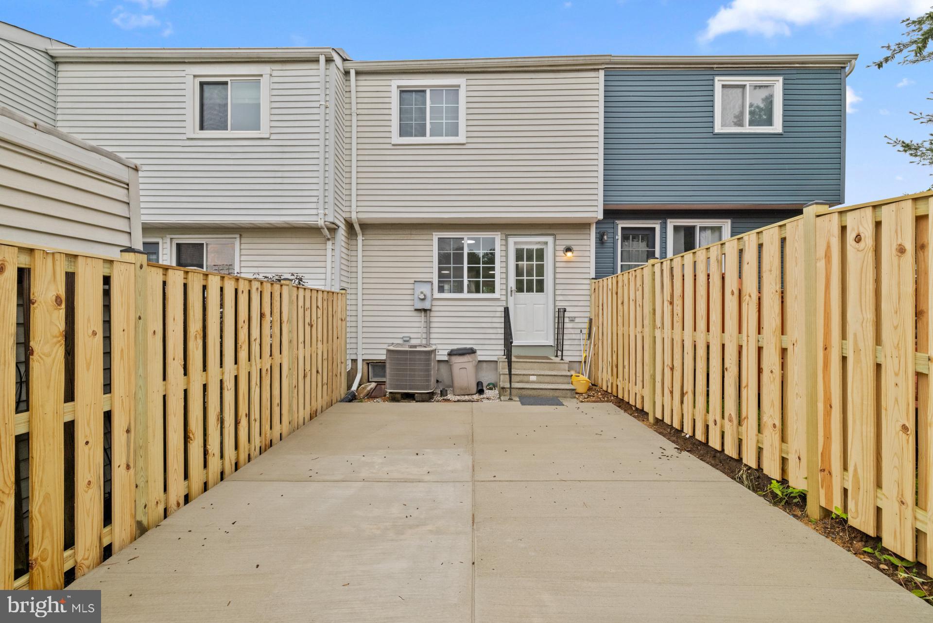 8318 Brookvale Court Springfield, VA 22153 - Photo 39 of 39 a view of a house with wooden fence