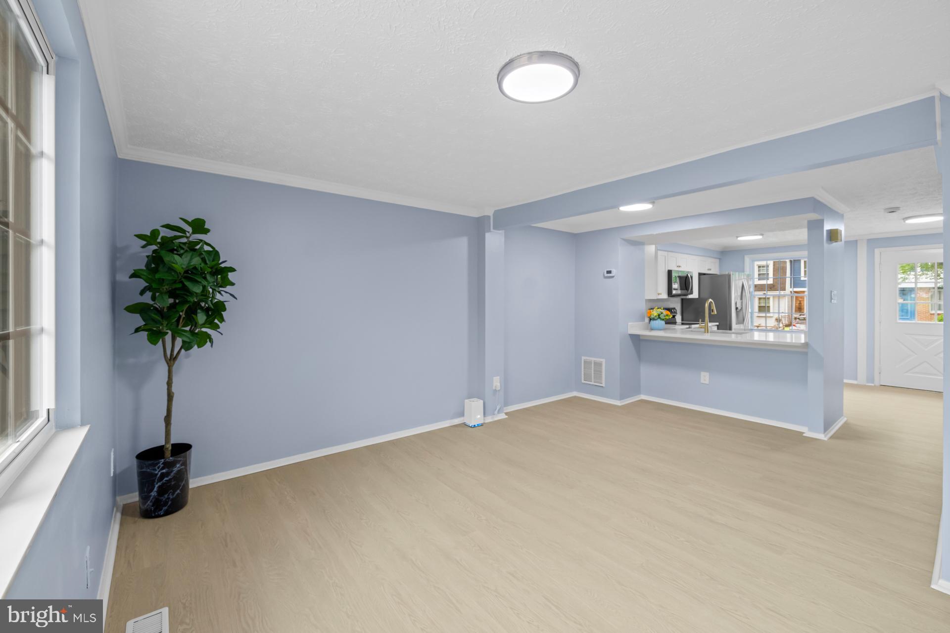 8318 Brookvale Court Springfield, VA 22153 - Photo 8 of 39 a view of an empty room with a window