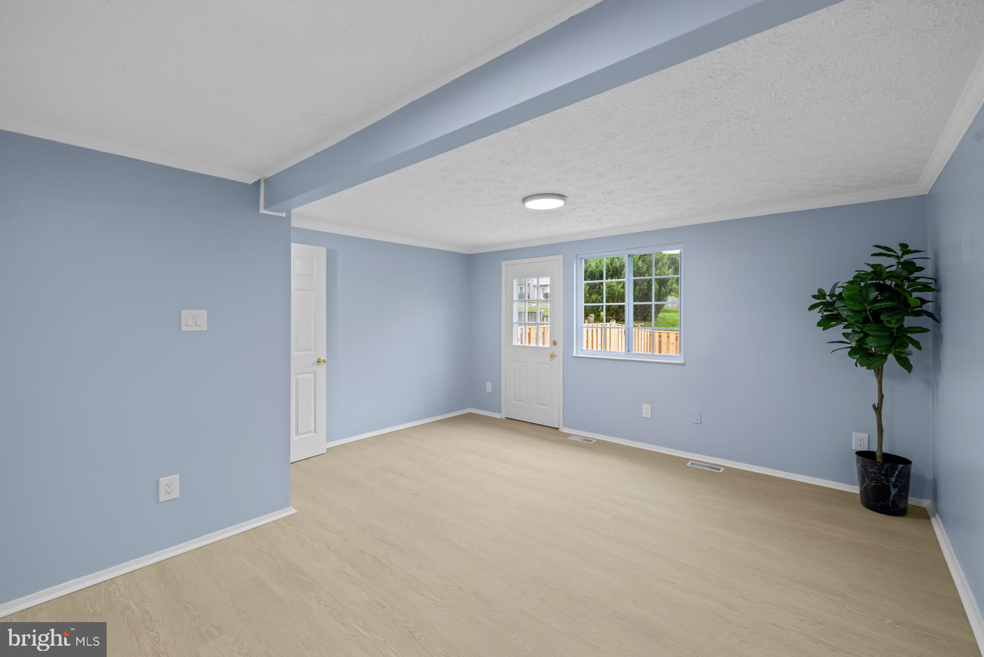 8318 Brookvale Court Springfield, VA 22153 - Photo 10 of 39 a view of an empty room with a window
