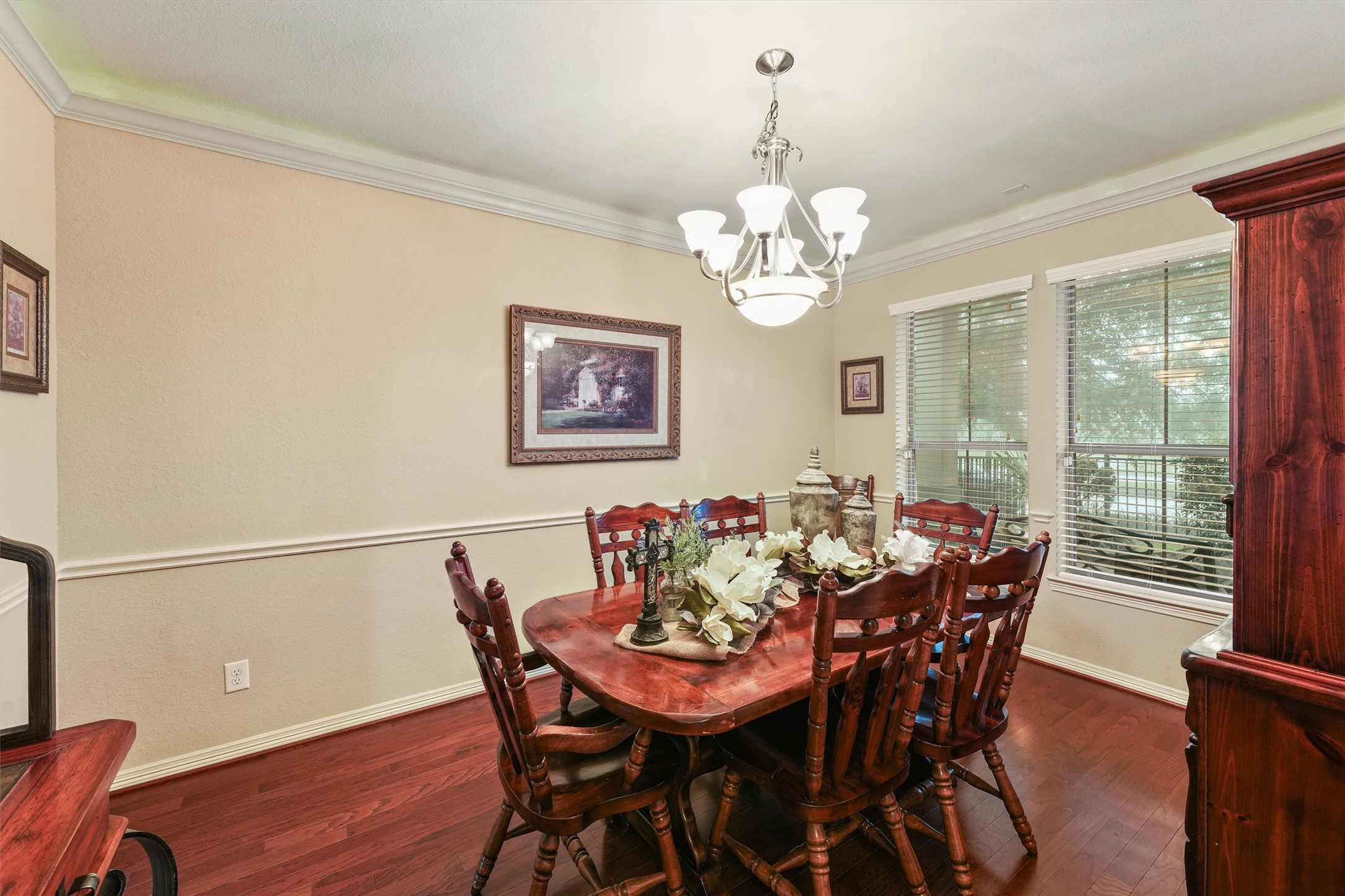 529 Water Street Webster, TX 77598 - Photo 11 of 38 a view of a dining room with furniture window and wooden floor