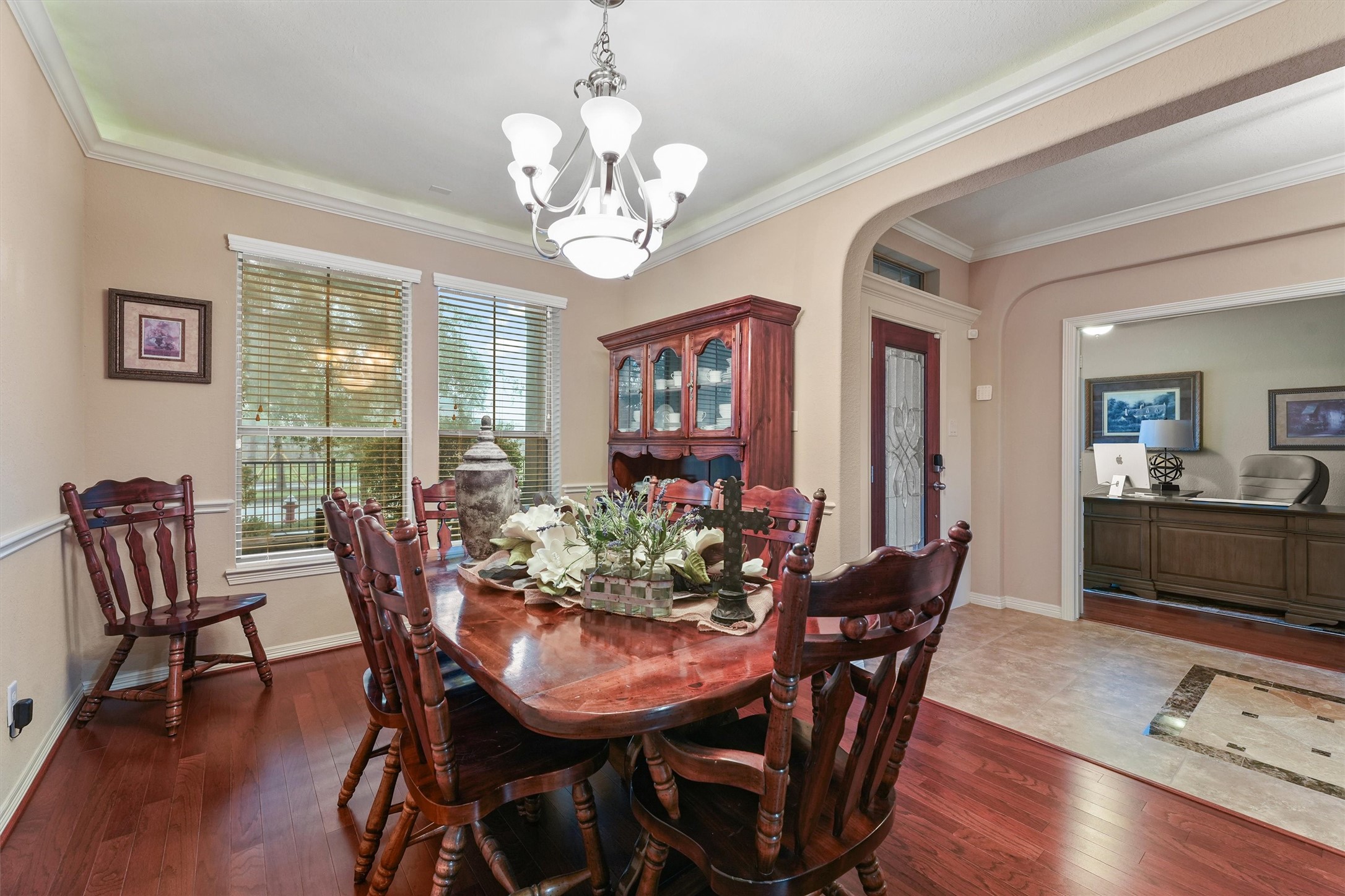 529 Water Street Webster, TX 77598 - Photo 12 of 38 a view of a dining room with furniture window and wooden floor