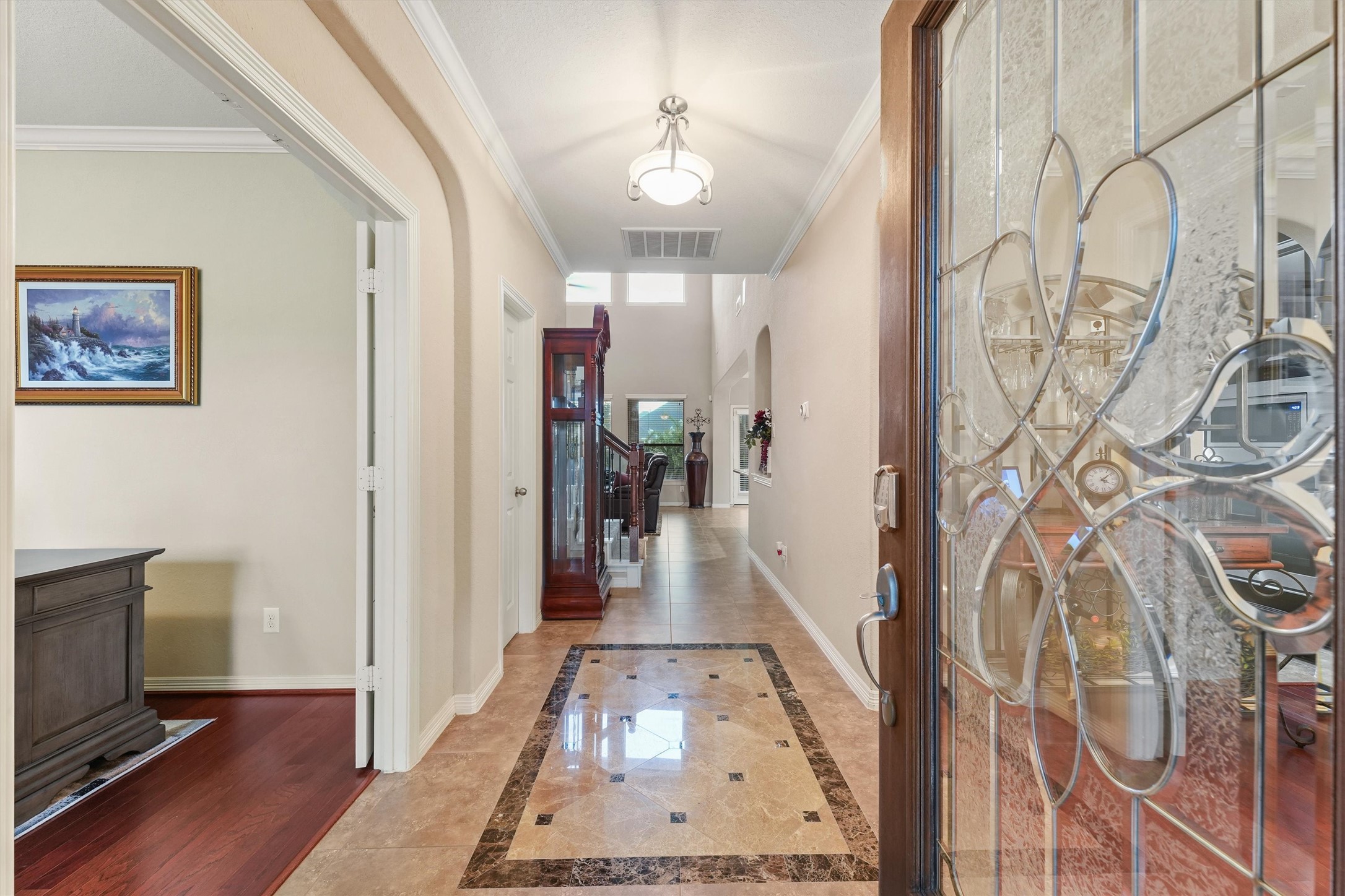529 Water Street Webster, TX 77598 - Photo 2 of 38 The entry way offers an inviting entrance with the office and dining room on either side.