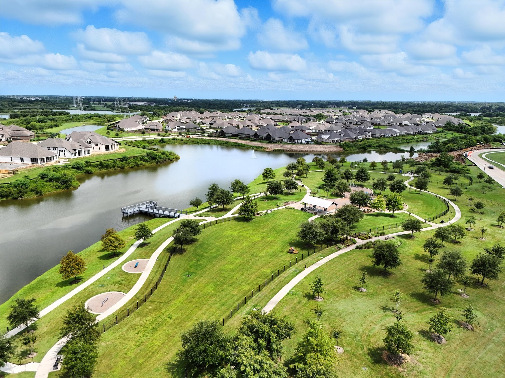 529 Water Street Webster, TX 77598 - Photo 5 of 38 an aerial view of residential houses with outdoor space and lake view