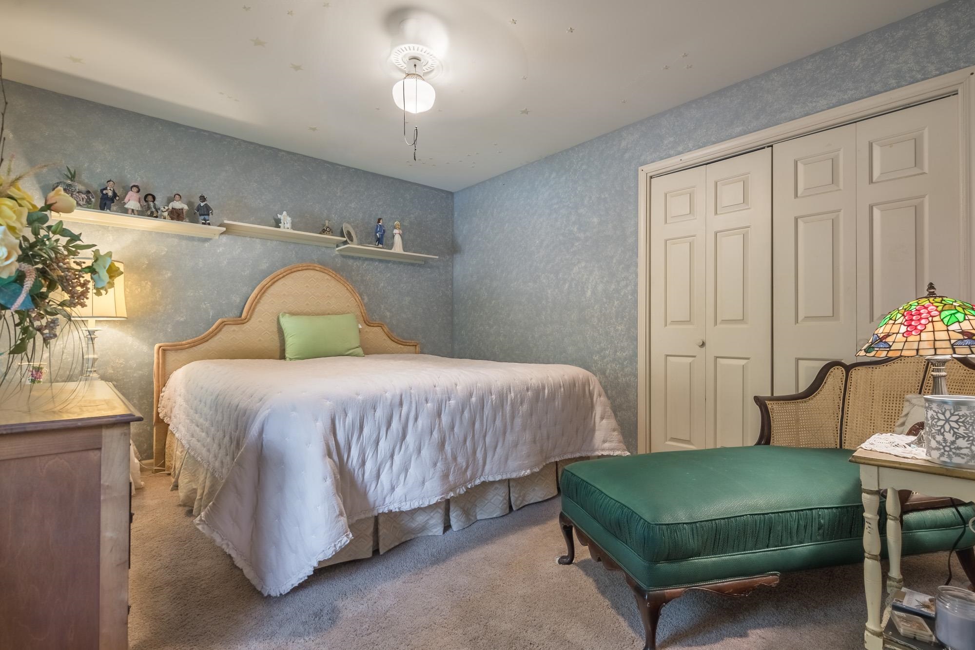 132 South Walnut Bend Road Memphis, TN 38018 - Photo 15 of 23 a bedroom with a bed and a table