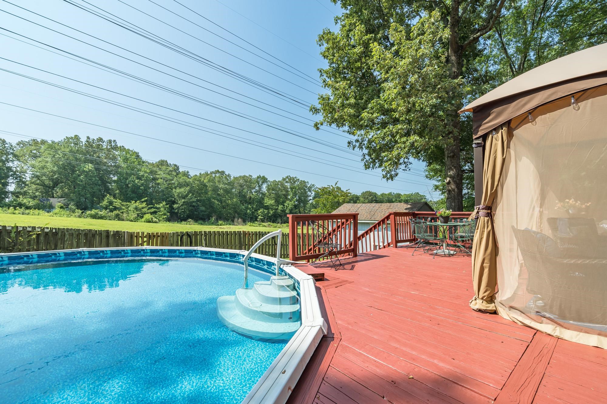 132 South Walnut Bend Road Memphis, TN 38018 - Photo 19 of 23 a view of a swimming pool with a patio