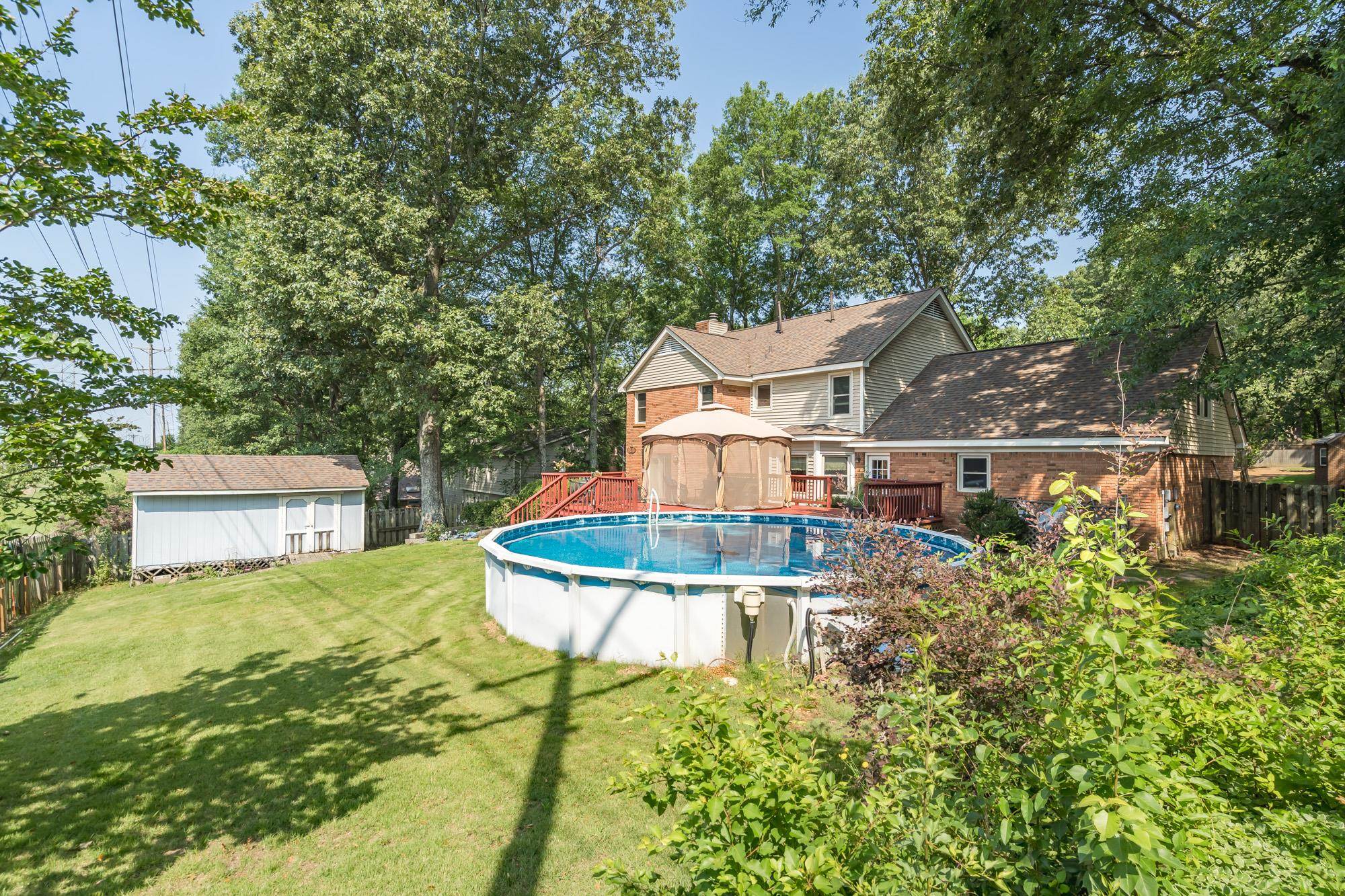 132 South Walnut Bend Road Memphis, TN 38018 - Photo 21 of 23 an aerial view of a house with swimming pool garden and patio