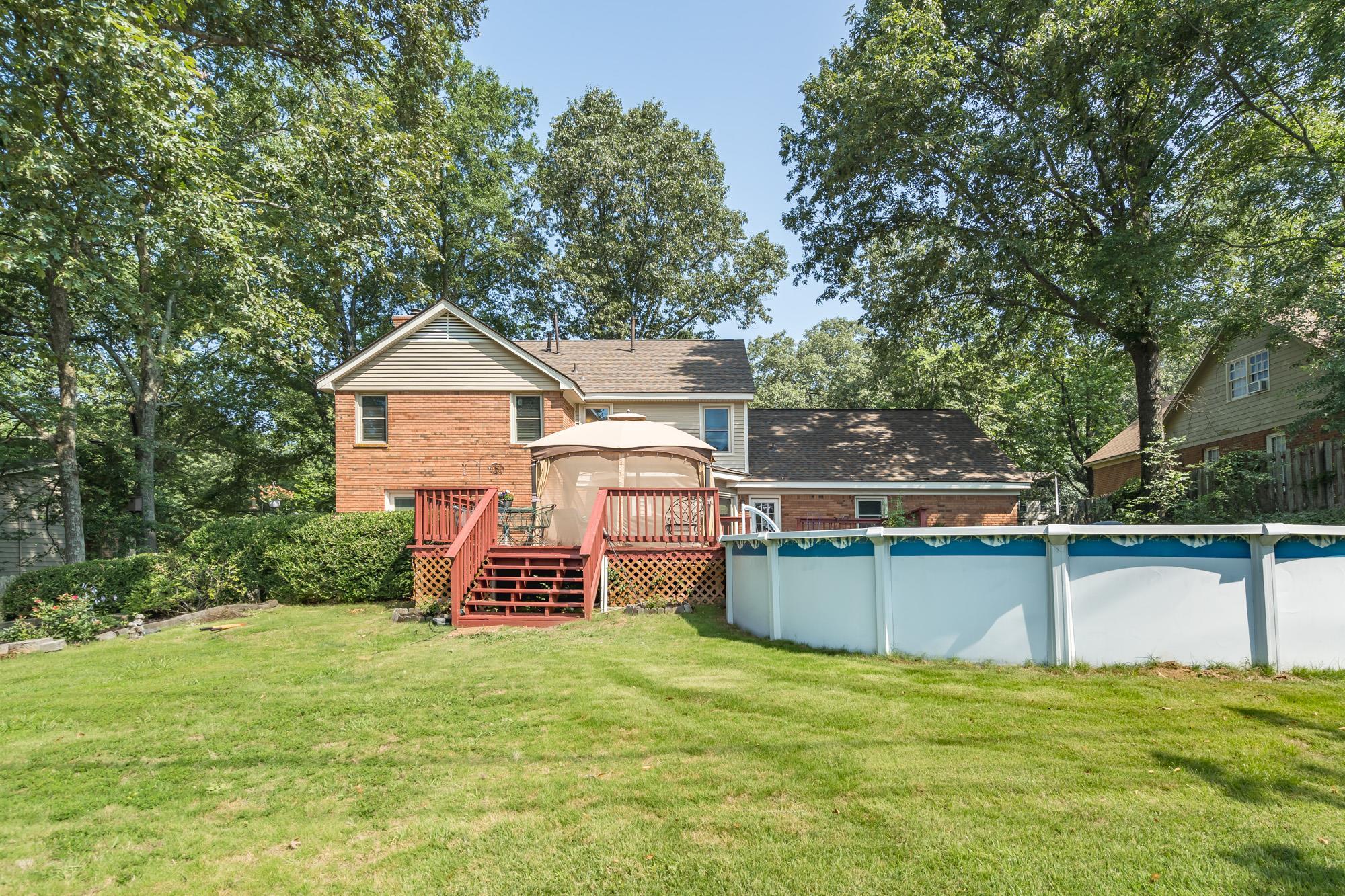 132 South Walnut Bend Road Memphis, TN 38018 - Photo 22 of 23 a view of a house with a yard