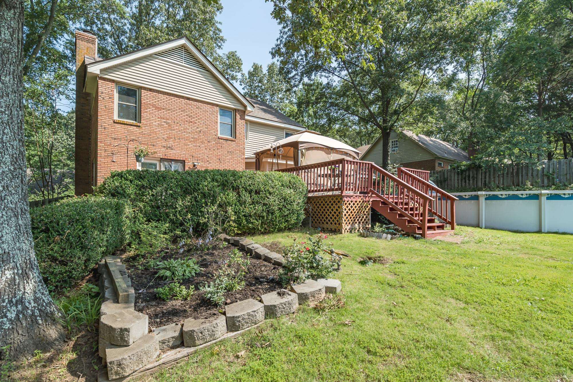 132 South Walnut Bend Road Memphis, TN 38018 - Photo 23 of 23 a view of a house with a yard