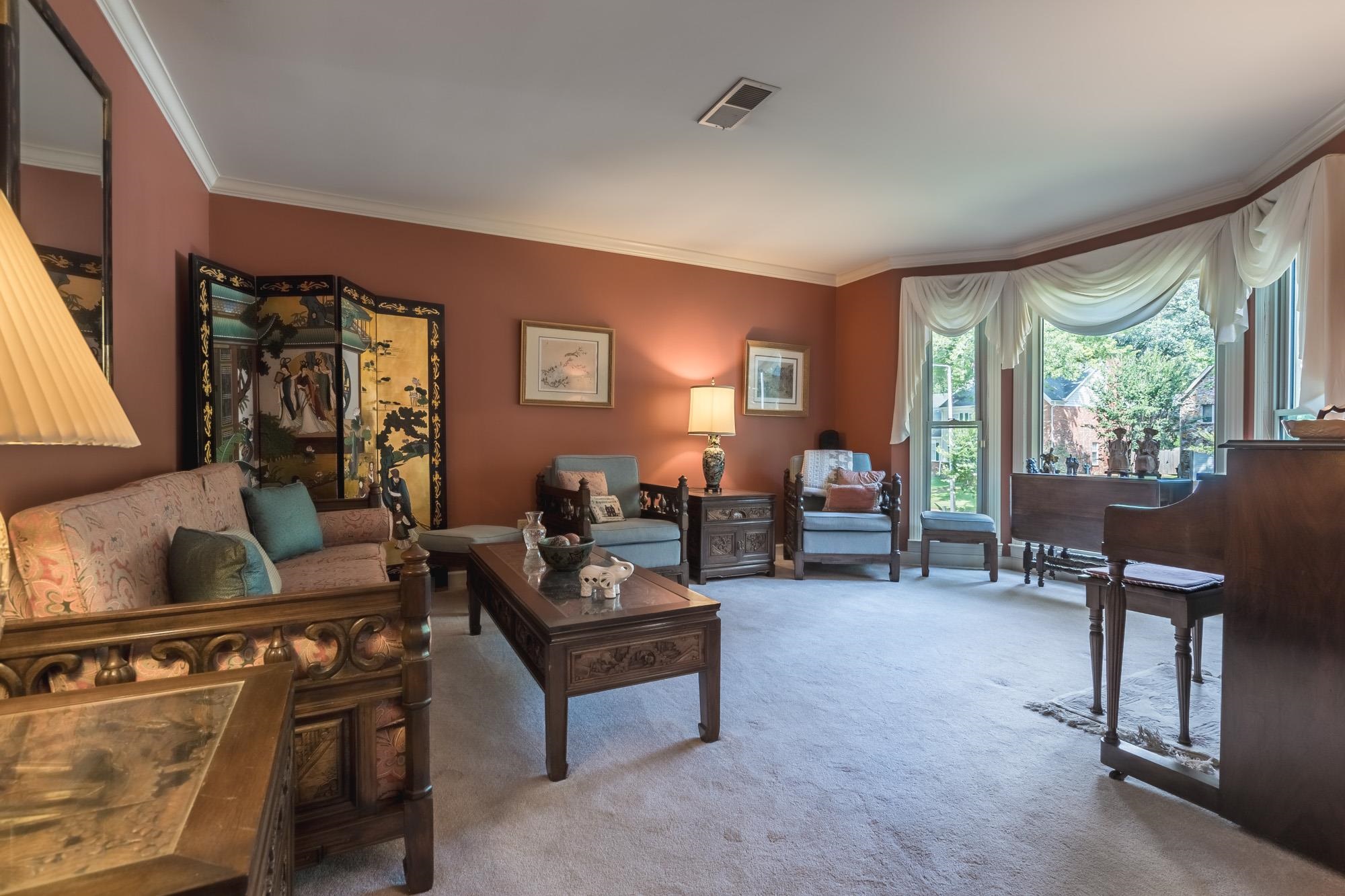 132 South Walnut Bend Road Memphis, TN 38018 - Photo 4 of 23 a living room with furniture and a fireplace