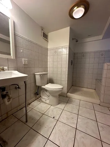 a view of a backyard with sitting area